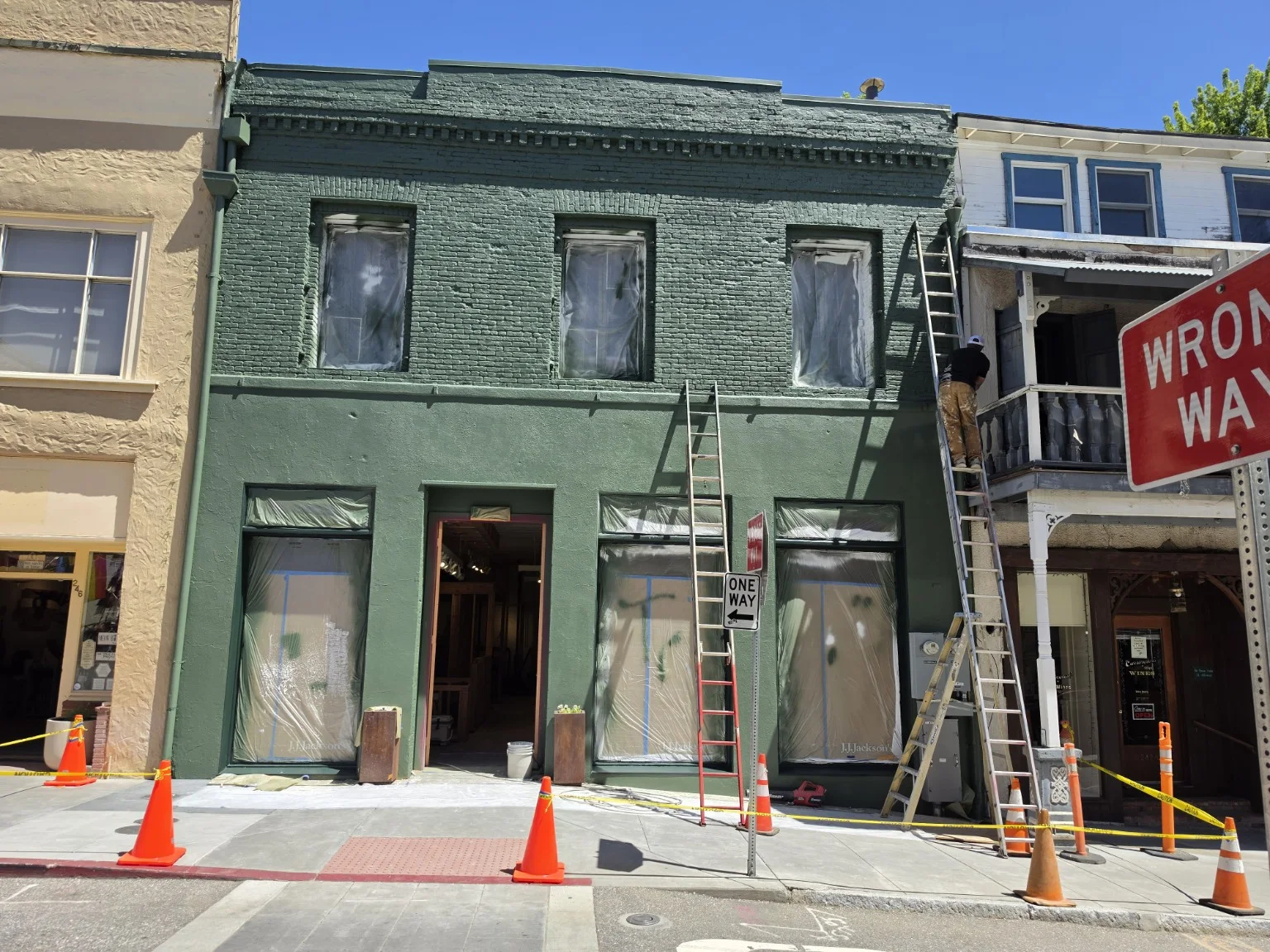 Detailed green exterior on a historic downtown building